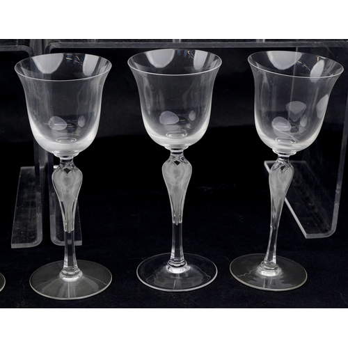 22 - A set of twelve Igor Carl Fabergé glasses with nude female frosted glass stems, by the Franklin mint... 