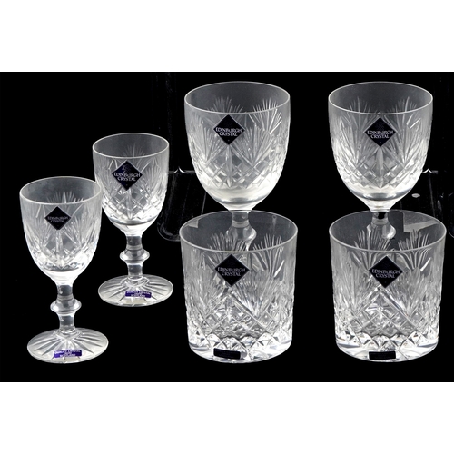 23 - A collection of Edinburgh Crystal glasses including Champagne flutes and tumblers, the largest 17cm ... 