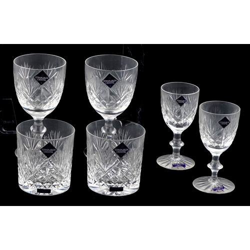 23 - A collection of Edinburgh Crystal glasses including Champagne flutes and tumblers, the largest 17cm ... 