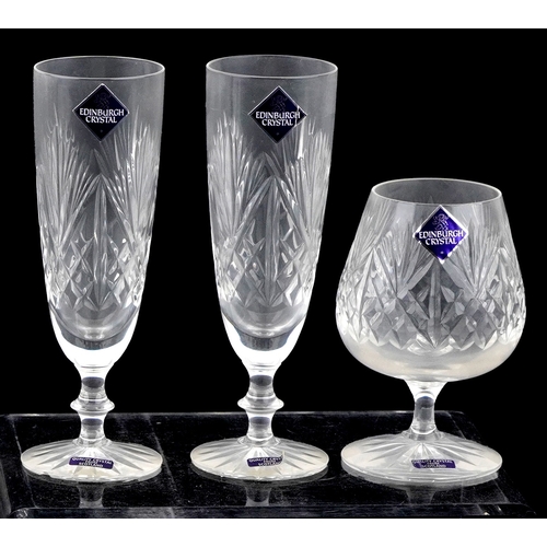 23 - A collection of Edinburgh Crystal glasses including Champagne flutes and tumblers, the largest 17cm ... 