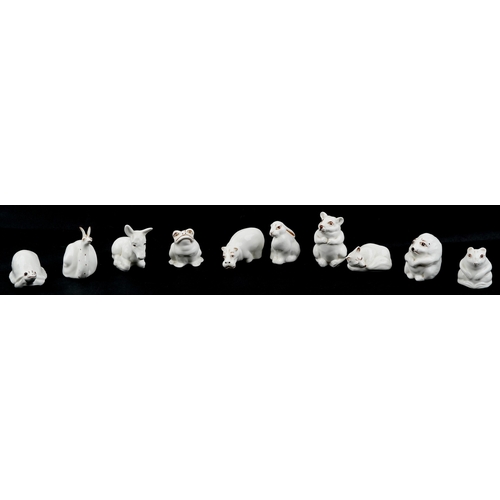 633 - A group of ten Coalport fine bone china figures of animals including tortoise, snail, frog and hedge... 