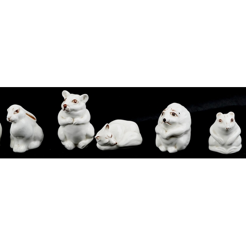 633 - A group of ten Coalport fine bone china figures of animals including tortoise, snail, frog and hedge... 