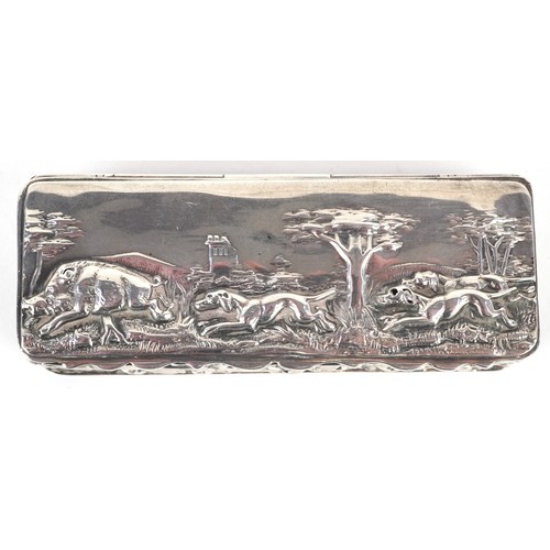 53 - An Edwardian silver hunting interest box, the hinged lid embossed with a hunting scene, Chester 1902... 