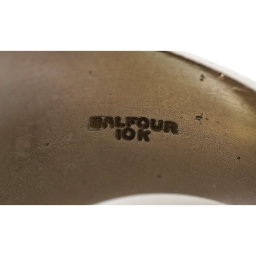 3116 - Balfour, a 10ct white gold white spinel solitaire ring, Baldwin High 1974, with enamelled and engrav... 