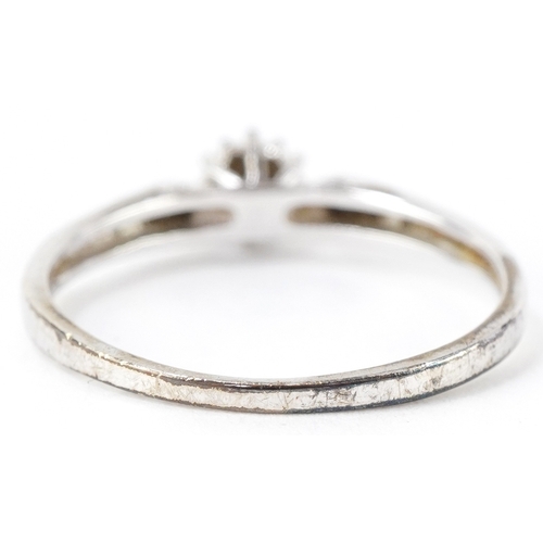 3131 - A 9ct white gold diamond solitaire ring with diamond set shoulders, total diamond weight approximate... 