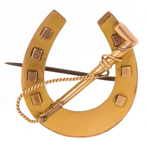 Adie & Lovekin, a Victorian 9ct gold equestrian interest brooch in the form of a riding crop and horseshoe, Birmingham 1889, 3.3cm high, 4.0g.