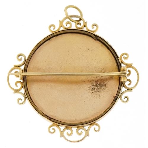 3007 - An unmarked high carat gold and enamelled pendant brooch hand painted with Pointer dogs, 4.0cm high,... 