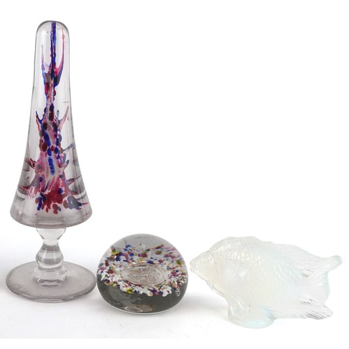 440 - A collection of glass paperweights including footed examples and an opalescent fish, the largest 23c... 