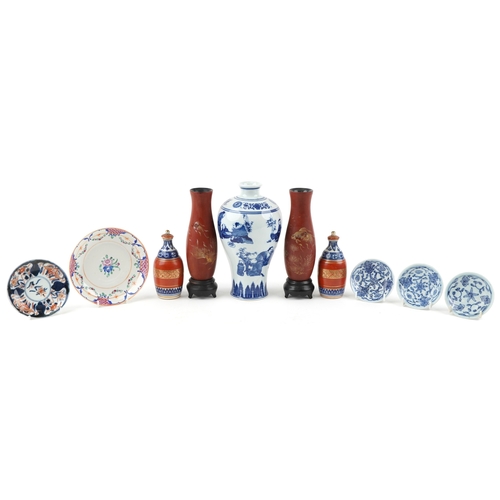 1733 - A collection of Chinese and Japanese porcelain including hand painted dishes, a blue and white balus... 