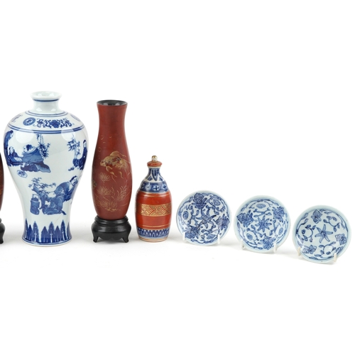 1733 - A collection of Chinese and Japanese porcelain including hand painted dishes, a blue and white balus... 