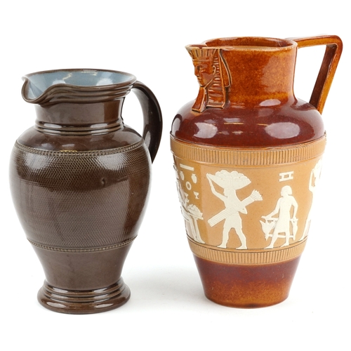 325 - A Doulton Lambeth stoneware jug decorated with Egyptian figures, bearing impressed marks to the base... 