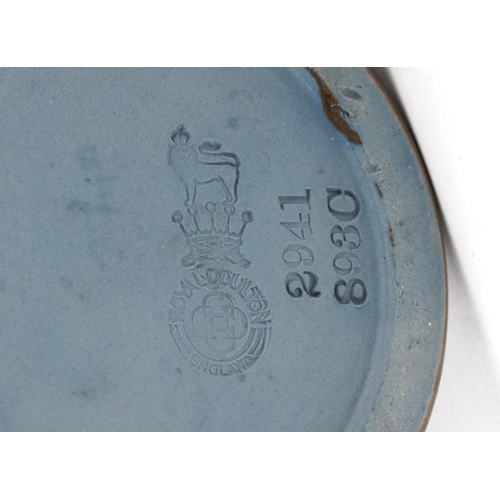 325 - A Doulton Lambeth stoneware jug decorated with Egyptian figures, bearing impressed marks to the base... 