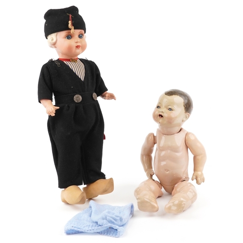734 - Two early 20th century dolls comprising a German composite doll and a Dutch doll with jointed limbs,... 