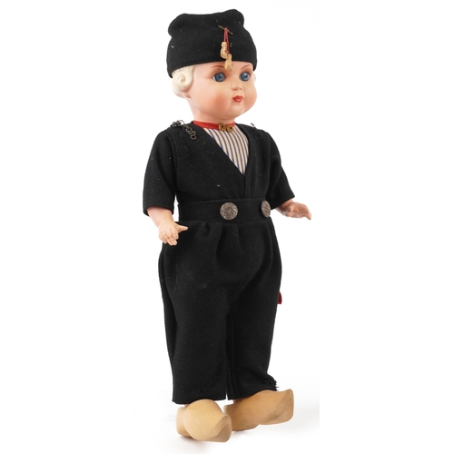 734 - Two early 20th century dolls comprising a German composite doll and a Dutch doll with jointed limbs,... 