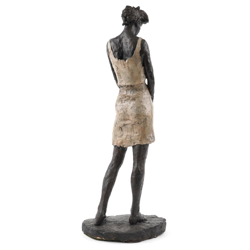 114 - A late 20th century bronzed plaster sculpture of a lady, 75cm high.