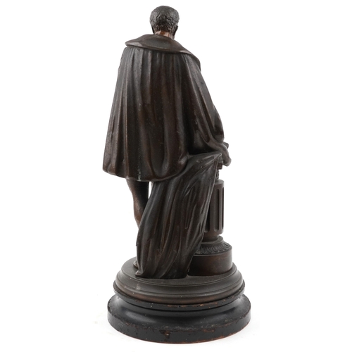 102 - A 20th century bronzed figure of William Shakespeare modelled leaning against a column, on an ebonis... 