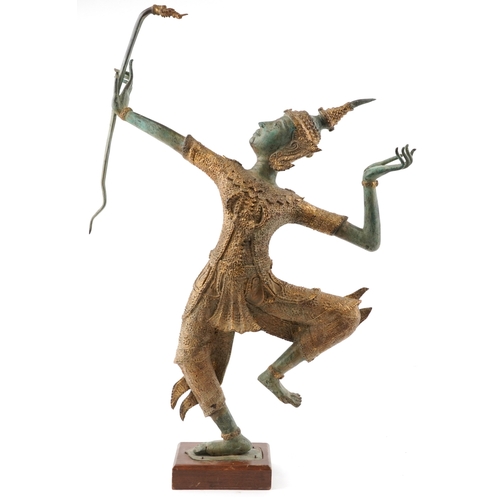  A Taiwanese green and gilt patinated bronze sculpture of an archer, late 20th century, mounted on a ... 