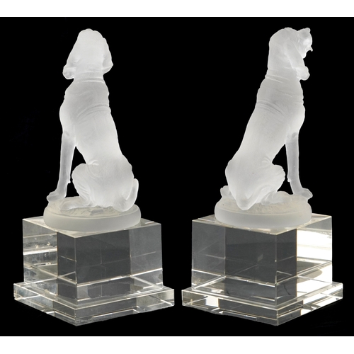 107 - After P. J. Mêne, two late 20th century frosted glass sculptures of seated dogs, signed, each mounte... 