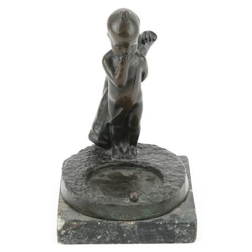 233 - A 20th century golfing interest bronze figure of a Putto with golf clubs, raised on a marble base, 1... 