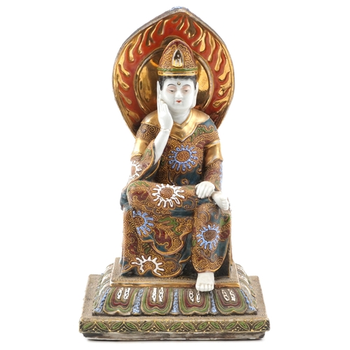 202 - A Japanese Satsuma porcelain figure of a seated emperor, 20th century, with polychrome enamelled dec... 