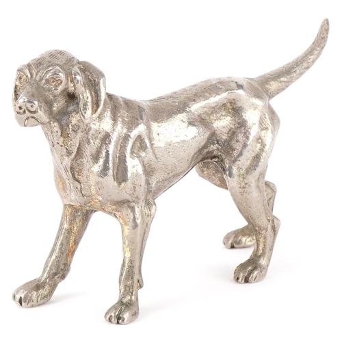 1465 - A 20th century cast metal model of a standing dog, 10cm high.