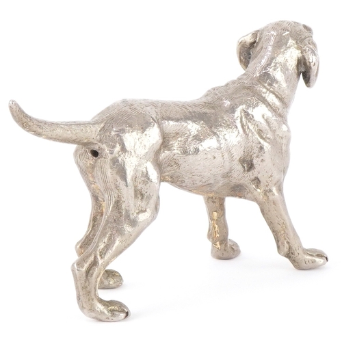 1465 - A 20th century cast metal model of a standing dog, 10cm high.