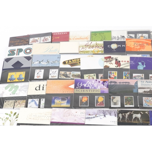 1283 - A large quantity of British presentation packs including high value definitives. the packs mainly wi... 