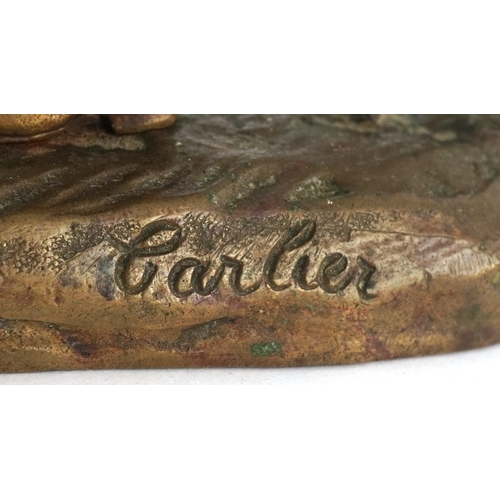 232 - After Émile Carlier, a bronze figure of a miner with wheelbarrow, 7cm high.