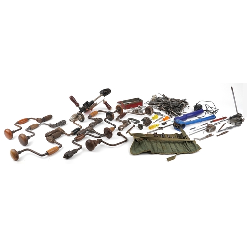 1703 - Vintage tools including hand drills and drill bits.