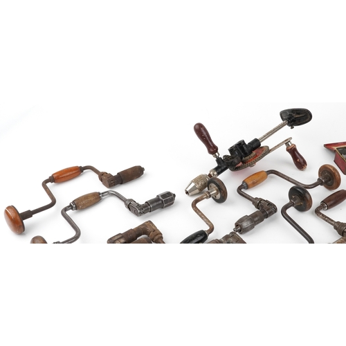1703 - Vintage tools including hand drills and drill bits.