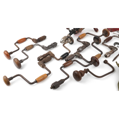 1703 - Vintage tools including hand drills and drill bits.
