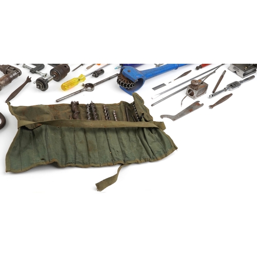 1703 - Vintage tools including hand drills and drill bits.