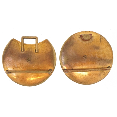 1602 - A Japanese brass champlevé enamel two piece belt buckle finely enamelled with flowers, 8cm wide.