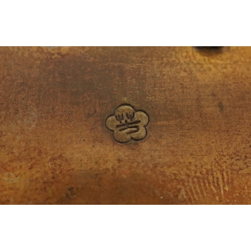 1602 - A Japanese brass champlevé enamel two piece belt buckle finely enamelled with flowers, 8cm wide.