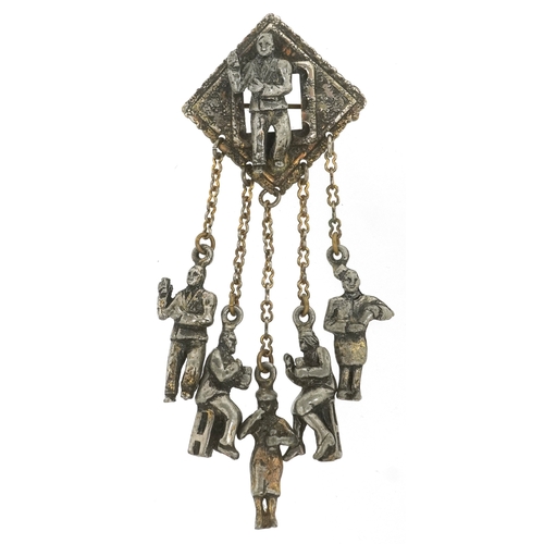 3364 - A vintage white metal dangling brooch in the form of figures at a bar bar including cocktail mixolog... 