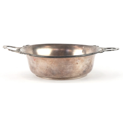 3702 - A silver quaich with twin handles and engraved monogram, 4cm high x 15cm wide, 69.8g.