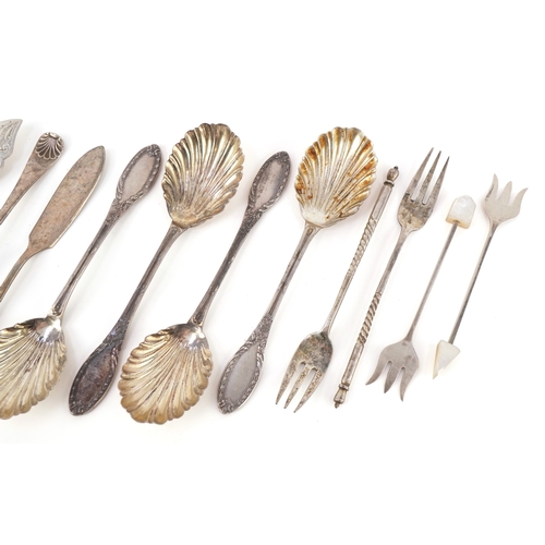 3695 - Victorian and later silver comprising cocktail forks with mother of pearl handles, butter knives and... 