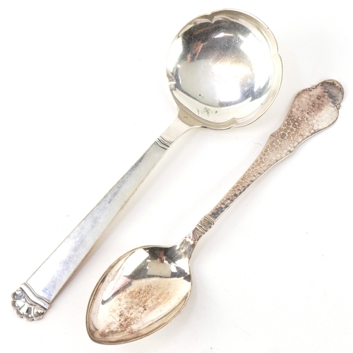 3689 - Johannes Siggaard, two Danish silver serving spoons, one with planished decoration, the largest 22cm... 