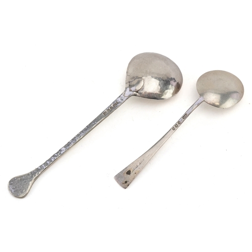 3699 - Two early 20th century silver spoons including a planished example, London 1928, the largest 12.9cm ... 