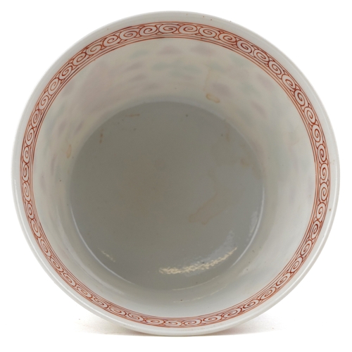 197 - A Chinese porcelain tea bowl hand painted in the famille verte palette with fish and iron red interi... 