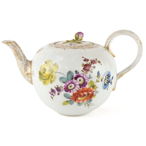 31 - A Meissen 19th century German porcelain teapot hand painted with flowers and a bark design spout and... 