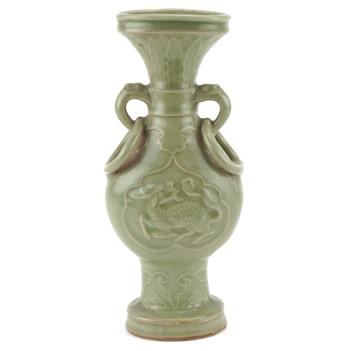 351 - A Chinese porcelain celadon glazed vase with ring turned handles decorated in relief with mythical a... 