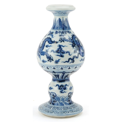 136 - A Chinese blue and white porcelain ewer hand painted with dragons amongst clouds, six figure charact... 
