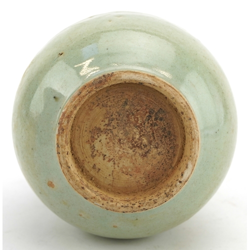 192 - A Chinese porcelain bottleneck vase having a celadon and sang de boeuf glaze, incised with a continu... 