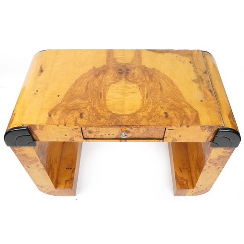 2191 - An Art Deco style walnut veneered console table, of 'U' form, H-82cm W-120cm D-64cm.