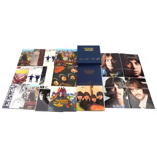 2615 - A small collection of vinyl LP records by The Beatles including Help, Sgt. Pepper's Lonely Hearts Cl... 