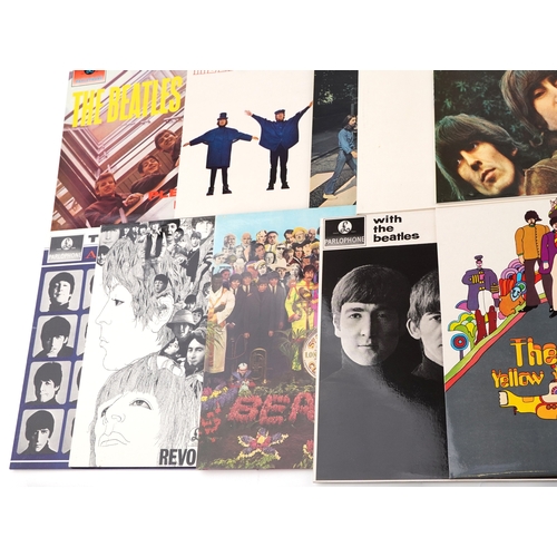 2615 - A small collection of vinyl LP records by The Beatles including Help, Sgt. Pepper's Lonely Hearts Cl... 