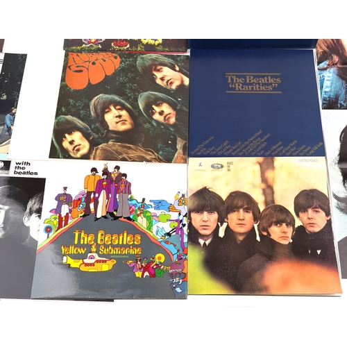 2615 - A small collection of vinyl LP records by The Beatles including Help, Sgt. Pepper's Lonely Hearts Cl... 