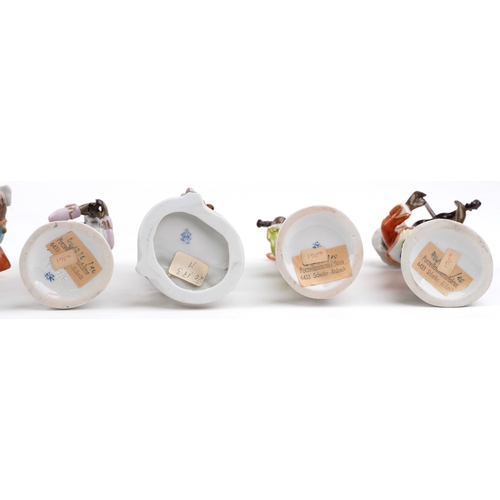 26 - A 20th century eleven piece German porcelain monkey band, after Meissen, comprising Älteste Volksted... 