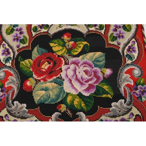 1020 - A pair of mid 20th century embroidery and beadwork pole screen panels with floral decoration, 49cm x... 